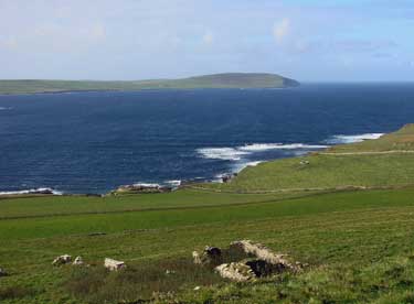 View to Midhowe Broch and across Eynhallow Sound