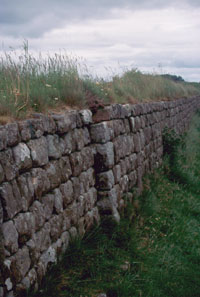 Junction between two sections of wall