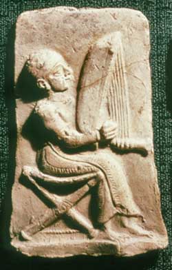 Terracotta plaque of a harpist